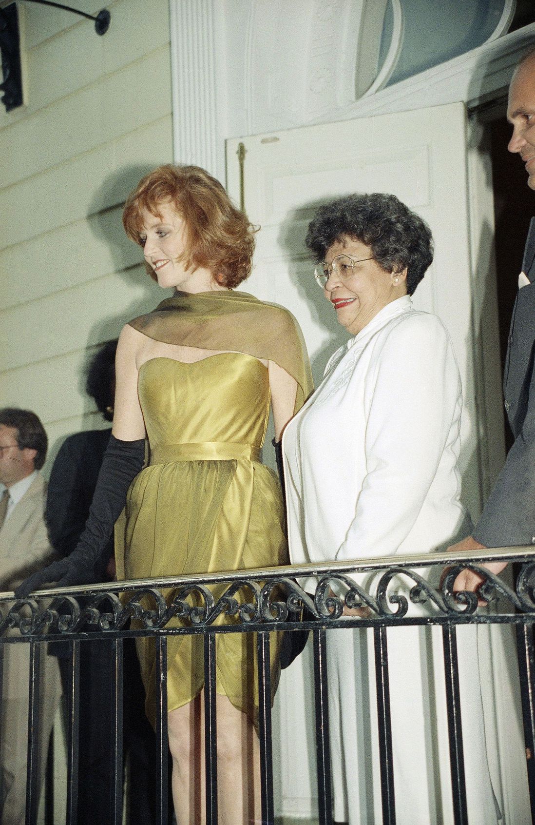 Sarah Ferguson, Duchess of York, stands on a balcony at Gracie Mansion alongside Joyce Dinkins.
